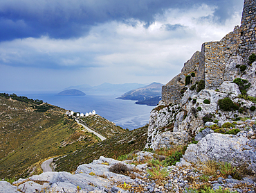 Medieval Castle and Windmills of Pandeli with stormy weather, Leros Island, Dodecanese, Greek Islands, Greece, Europe