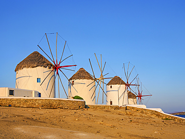 Chora Windmills at sunrise, Mykonos Town, Mykonos Island, Cyclades, Greek Islands, Greece, Europe