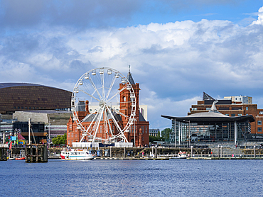 View towards Ferris Wheel and Pierhead Building, Cardiff Bay, Cardiff, Wales, United Kingdom, Europe