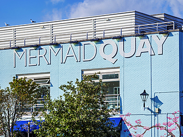 Mermaid Quay sign and architecture of Cardiff Bay, Cardiff, Wales, United Kingdom, Europe