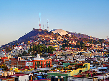 View towards the Cerro del Fortin at sunrise, Oaxaca de Juarez, Oaxaca State, Mexico