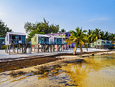 Traditional stilt houses at the waterfront of Caye Caulker, Belize District, Belize