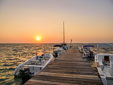 Jetty at sunrise, San Pedro Town, Ambergris Caye, Belize District, Belize