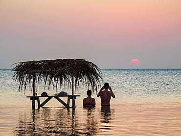 Swing Bar at sunset, Secret Beach, Ambergris Caye, Belize District, Belize