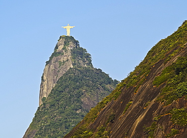 Christ the Redeemer statue on top of the Corcovado Mountain viewed from Santa Marta, Rio de Janeiro, Brazil, South America