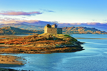 Castle Tioram on the coastal island Eilean Tioram where River Shiel and Loch Moidart meet, at low tide on a sunny winter morning, Highlands, Scotland, United Kingdom, Europe