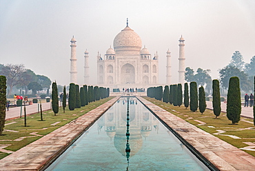 Taj Mahal reflections on a misty morning, UNESCO World Heritage Site, Agra, Uttar Pradesh, India, Asia