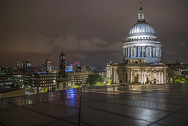 Floodlit dome of St. Pauls Cathedral at night from One New Change, City of London, London, England, United Kingdom, Europe