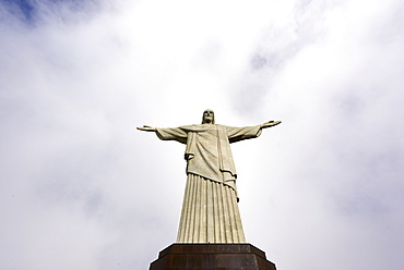 Low angle shot of Christ the Redeemer statue in Rio de Janeiro in a cloudy day, Rio de Janeiro, Brazil, South America