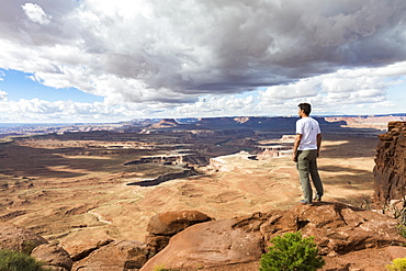 Man overlooking the landscape in Canyonlands National Park, Moab, Utah, United States of America, North America