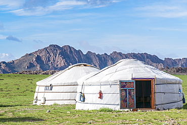 Mongolian gers and mountains in the background, Middle Gobi province, Mongolia, Central Asia, Asia