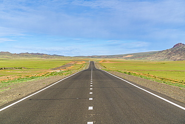 Straight paved road, Bayandalai district, South Gobi province, Mongolia, Central Asia, Asia