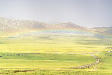 Rainbow over the green Mongolian steppe, Ovorkhangai province, Mongolia, Central Asia, Asia