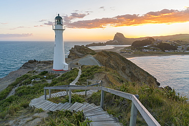 Castlepoint lighthouse and Castle Rock at sunset, Castlepoint, Wairarapa region, North Island, New Zealand, Pacific