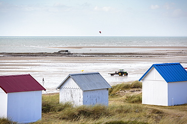 Beach huts and tractor for oyster breeding, Gouville-sur-Mer, Normandy, France, Europe