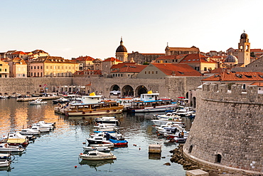 Boats in Dubrovnik harbour during sunset, UNESCO World Heritage Site, Dubrovnik, Croatia, Europe