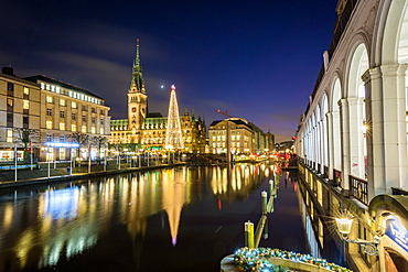 Reflection of Hamburg's Town Hall (Rathaus) and Christmas Market at blue hour, Hamburg, Germany, Europe