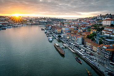 Sunset over Porto looking towards the Ribeira district from the Dom Luis I Bridge, UNESCO World Heritage Site, Porto, Portugal, Europe