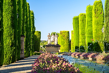 Cypress trees, statues and fountains in the gardens of the Alcazar de Los Reyes Cristianos, UNESCO World Heritage Site, Cordoba, Andalusia, Spain, Europe