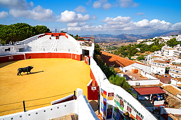 A view over Mijas bullring, Plaza de Toros, and the whitewashed buildings of the Andalusia town of Mijas Pueblo, Andalusia, Spain, Europe