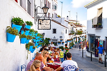 Blue plant pots on the white walls of La Boveda del Flamenco cafe bar, Plaza de la Constitucion, Mijas Pueblo, Andalusia, Spain, Europe