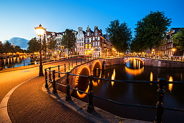 A long exposure of Amsterdam's southern canal rings at the intersection of Leidsegracht and Keizersgracht, Amsterdam, The Netherlands, Europe