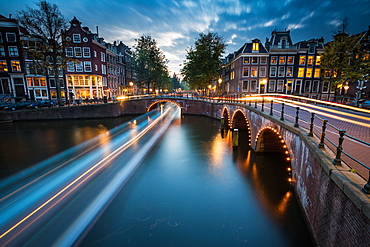 A long exposure of Amsterdam's southern canal rings at the intersection of Leidsegracht and Keizersgracht, Amsterdam, The Netherlands, Europe