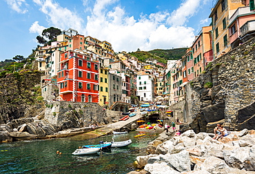 The colourful buildings and boats in Riomaggiore harbour, Cinque Terre, UNESCO World Heritage Site, Liguria, Italy, Europe