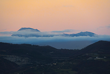 Italy, Umbria, Gubbio, Monte Catria at sunset