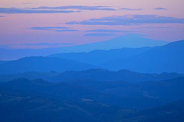 Italy, Umbria, Gubbio, Apennines at blue hour