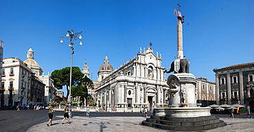 cityscape image of Duomo Square in Catania, Sicily with Cathedral of Saint Agatha at sunrise