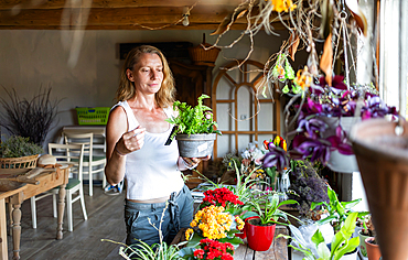 woman working in her flower shop