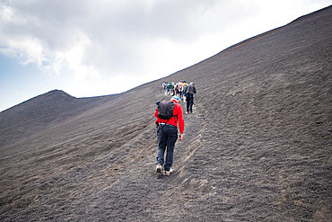 hiker trekking on mount Etna