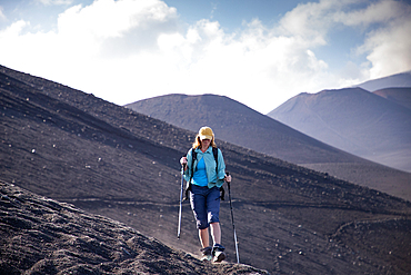 hiker trekking on mount Etna