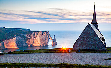 Notre-Dame de la Garde chapel and Porte d'Aval in the background, Etretat, Normandy, France, Europe