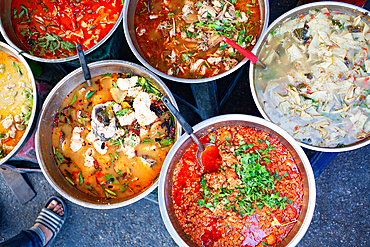 delicious fresh street food in Thailand - top view - Thai Curry, Tamarind, Tom Yam, Shrimp, Pork, Pad Thai