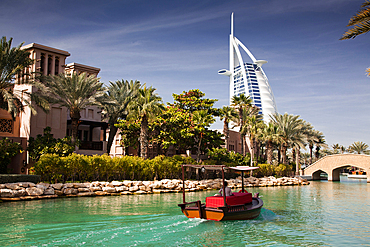 View on Burj Al Arab, the world only seven stars hotel seen from Madinat Jumeirah, a luxury resort which include hotels and souk spreding across over 40 hectars.