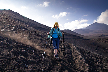hiker trekking on mount Etna