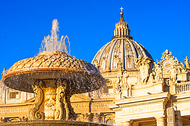 St. Peter's Basilica Cupola and fountain in early morning light, Vatican City, UNESCO World Heritage Site, Rome, Lazio, Italy, Europe