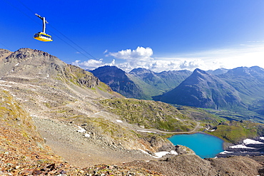 Diavolezza cableway transit above Diavolezza Lake, Bernina Pass, Engadine, Graubunden, Switzerland, Europe