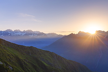 Sunrise at high altitude with Bernina mountain range in the background, Valmalenco, Valtellina, Lombardy, Italy, Europe