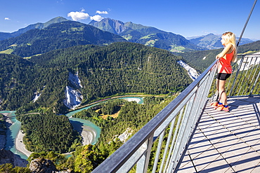 Young girl looks over the river from Il Spir terrace, Rhine Gorge (Ruinaulta), Flims, District of Imboden, Canton of Grisons (Graubunden), Switzerland, Europe