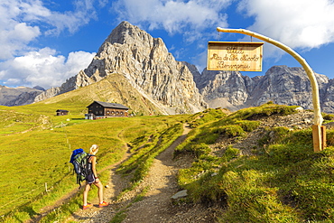 Hiker at Passo San Nicolo Refuge, San Nicolo Pass, Fassa Valley, Trentino, Dolomites, Italy, Europe