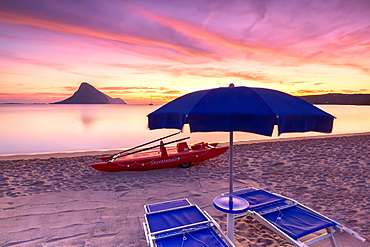 Amazing sunrise on the beach of Porto Taverna with the Tavolara Island in the background, Loiri Porto San Paolo, Olbia Tempio province, Sardinia, Italy, Mediterranean, Europe