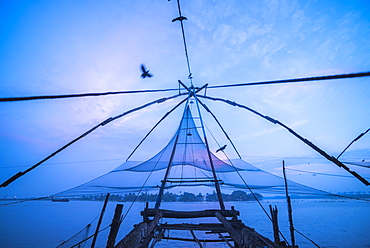 Traditional Chinese fishing nets at dawn, Fort Kochi (Cochin), Kerala, India, Asia