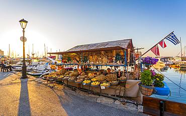 Souvenirs and sea sponges for sale on a boat in Chania, Crete, Greek Islands, Greece, Europe