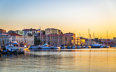 Dusk light over moored boats in the harbour, Chania, Crete, Greek Islands, Greece, Europe