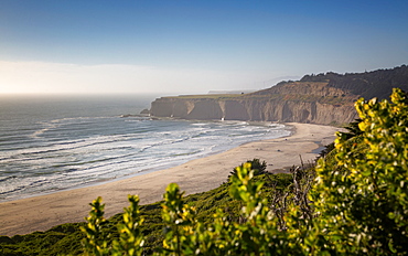 View of beach and cliffs on Highway 1 near Davenport, California, United States of America, North America