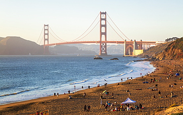 Sun sets near the Golden Gate Bridge, Baker Beach, San Francisco, California, United States of America, North America