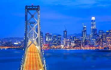 View of San Francisco skyline and Oakland Bay Bridge from Treasure Island at dusk, San Francisco, California, United States of America, North America